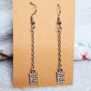 7/$10 E Initial Earrings, New